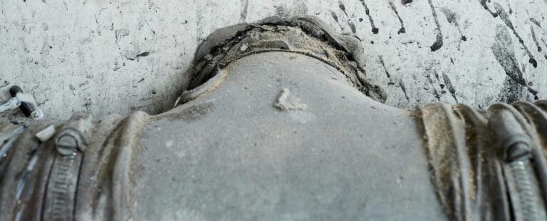 Asbest achter een radiator